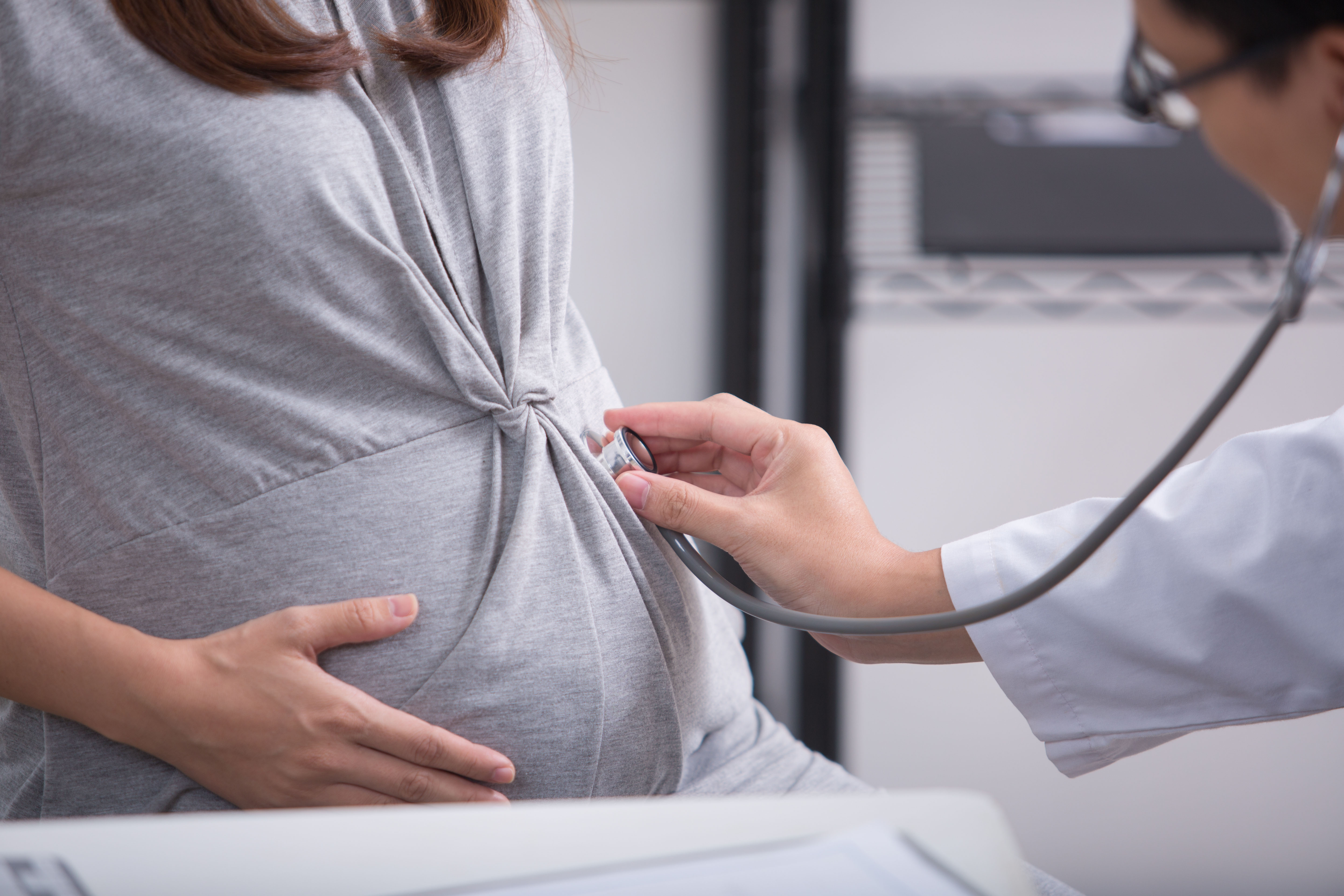 Checking a pregnant woman before delivery in Chile